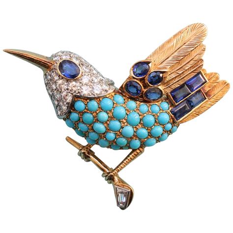 caged bird brooch by cartier|cartier bird brooch.